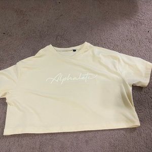 Yellow alphalete crop top